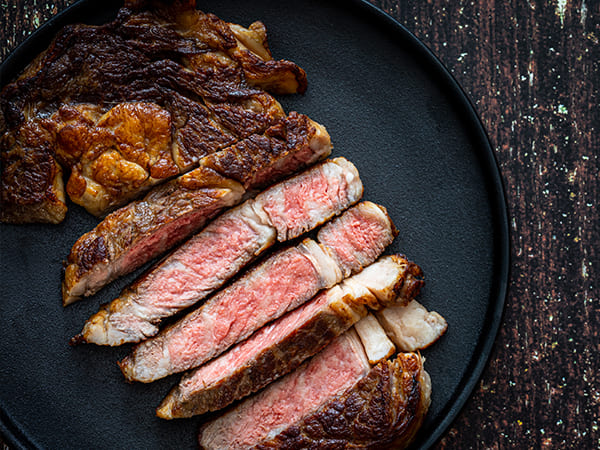Ribeye steak with tomato tapenade