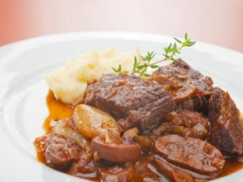 Kalfswangen met Spaanse kaaspuree